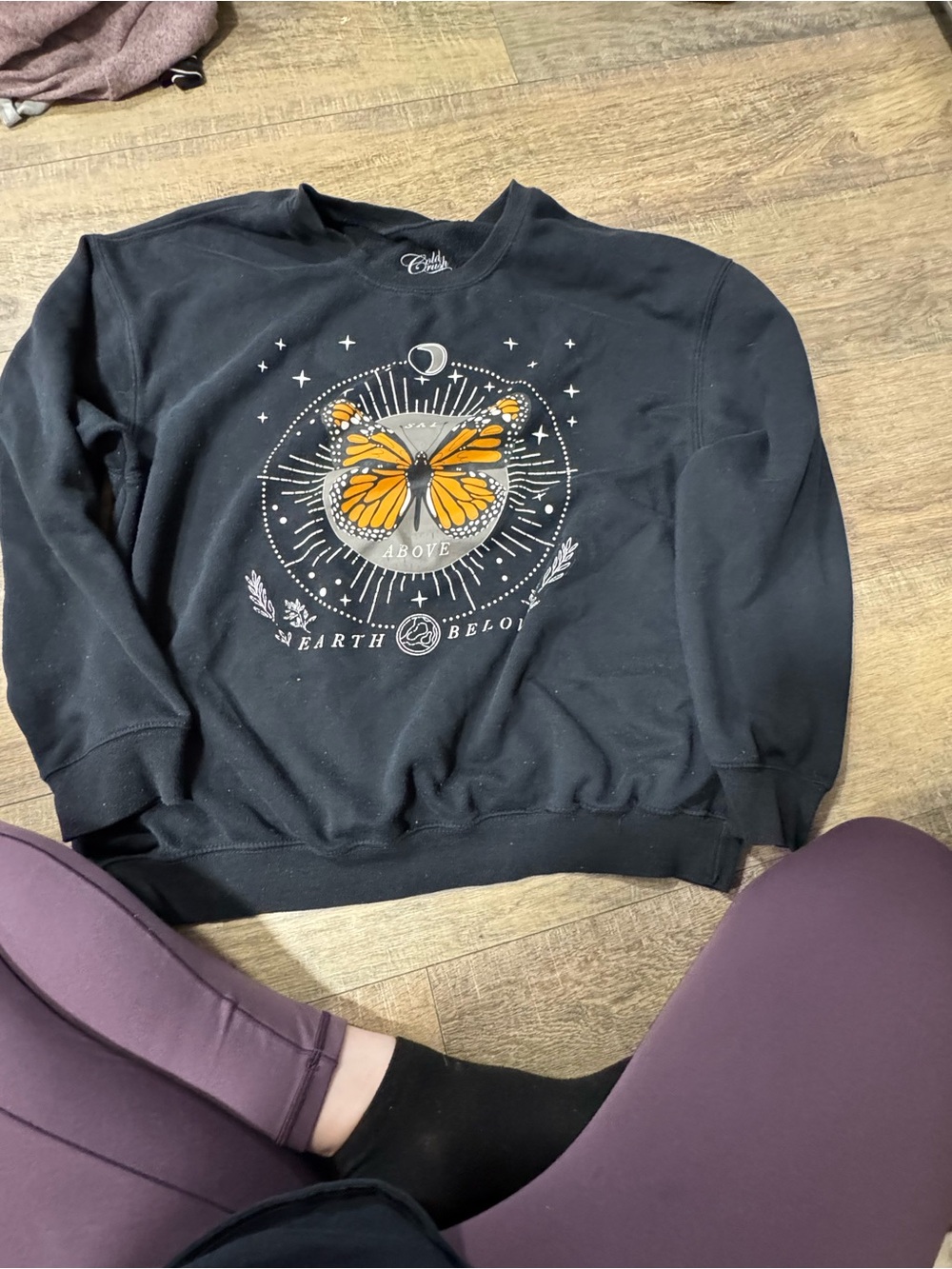 Cold Crush Black Sweatshirt with Orange Butterfly Graphic